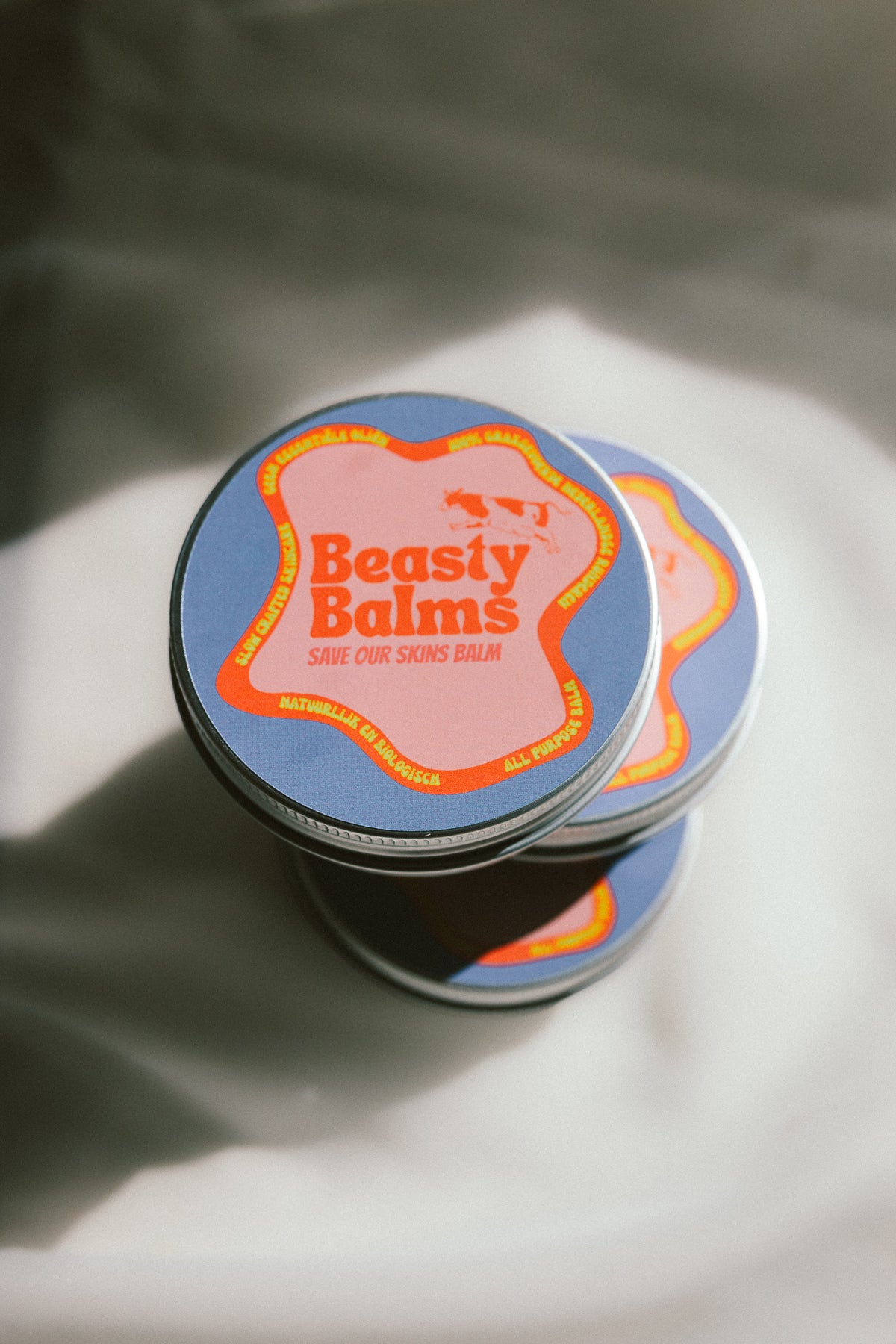 Top view of a tin of Save Our Skins tallow balm